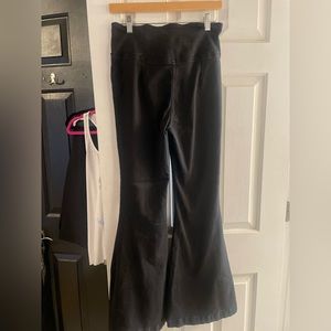 WE THE FREE Size 29 Black High Wasted Flared Jeans.